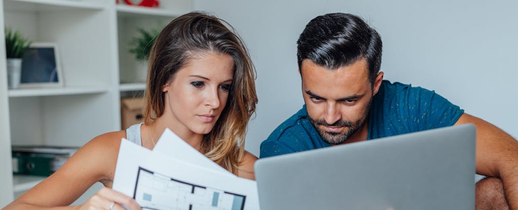 Young couple is using laptop pc