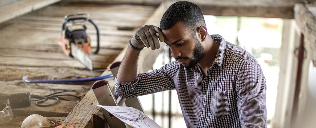 Young man renovating an attic