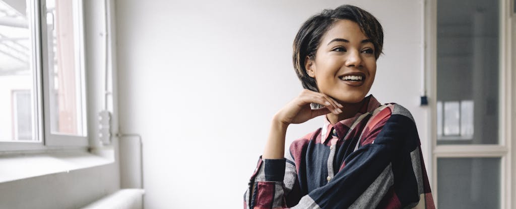 Smiling woman sitting on chair