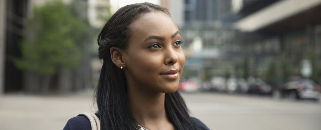 Thoughtful woman considering Prosper healthcare lending