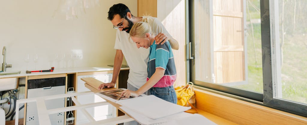 A couple reviews plans for home improvements they're making using a TD Bank HELOC.